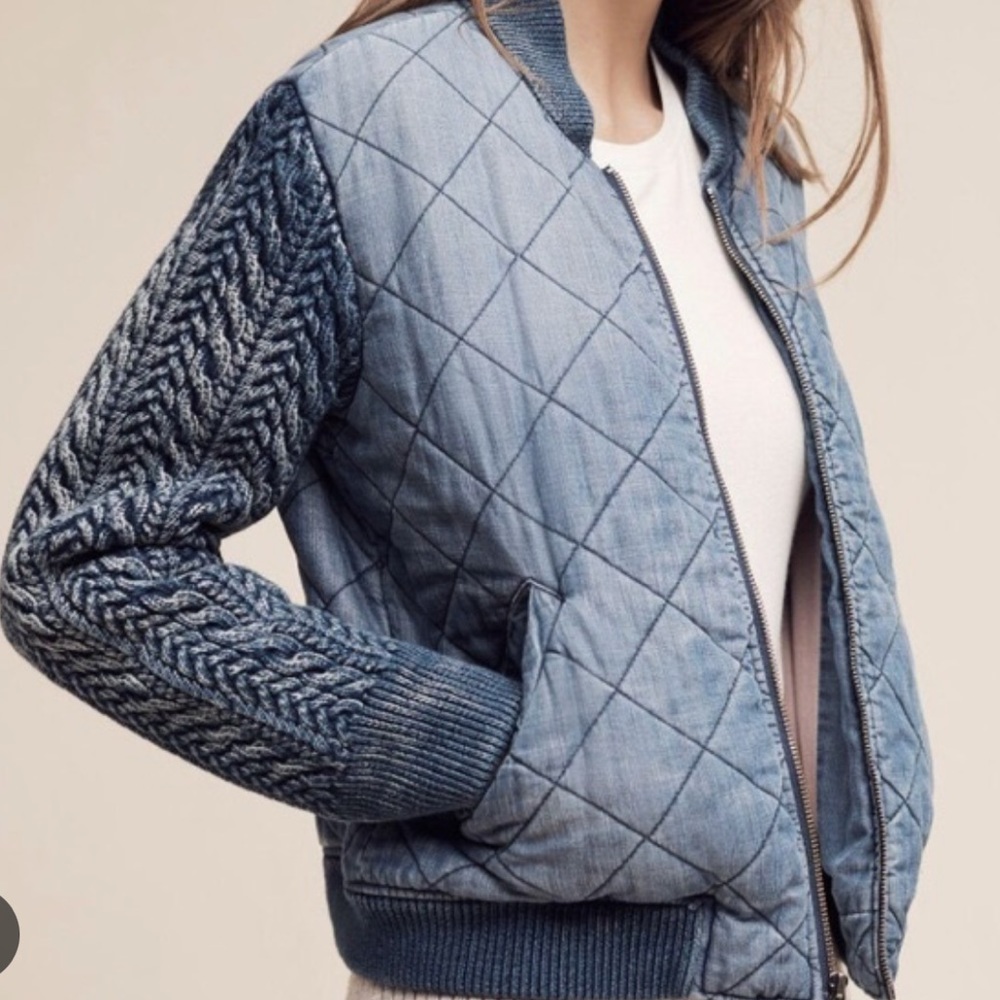 Blue bomber jacket with knitted sleeves